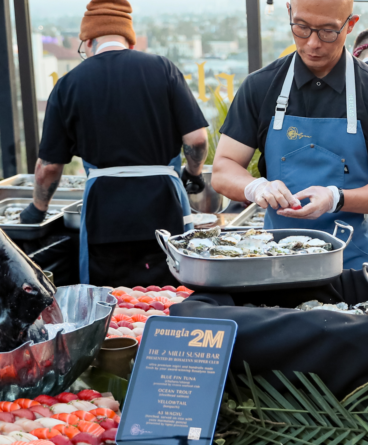 Chef Jasper Lynn cooking on the line for the Rosalynn farm dinner series